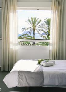 Postel nebo postele na pokoji v ubytování Moraira Beach 1