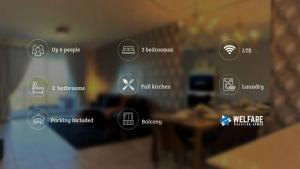 a room with a bunch of symbols on a wall at Stay Our Stylish 2 Br, 6 Minutes To Disney World in Kissimmee