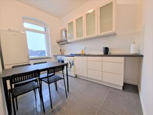 Η κουζίνα ή μικρή κουζίνα στο VS Workers Apartment T1-6