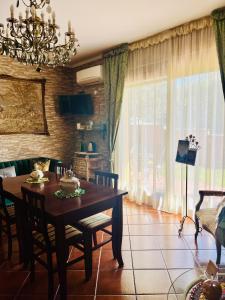 TV a/nebo společenská místnost v ubytování La Mammola Bed&Breakfast