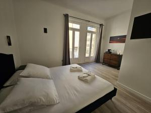 Postel nebo postele na pokoji v ubytování Villa Berlioz