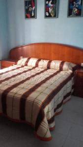 En eller flere senge i et værelse på Casa Avenida Guadalquivir