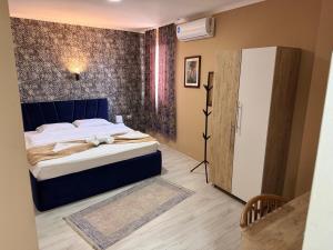 Postel nebo postele na pokoji v ubytování Hotel Alisa + 15 fotografií
