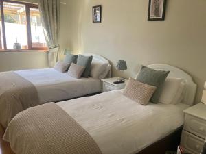 Letto o letti in una camera di Steeple View B&B Guesthouse Donegal - Newly renovated in 2023
