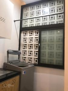 Η κουζίνα ή μικρή κουζίνα στο Gp Apartment near My Khe Da Nang +6 φωτογραφίες