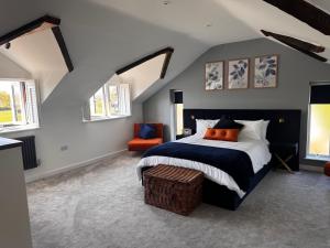 Ένα ή περισσότερα κρεβάτια σε δωμάτιο στο Byways Cottage, Wellington