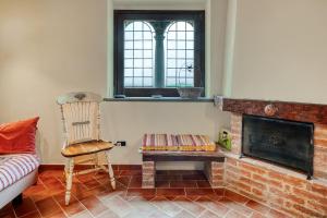 Χώρος καθιστικού στο GuestHost - Il Glicine, apt with garden and pool