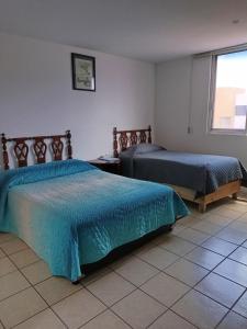 Postel nebo postele na pokoji v ubytování Loft Maria