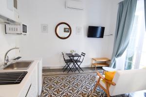 Kuchnia lub aneks kuchenny w obiekcie Letmalaga Soho Apartments