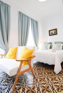 Posteľ alebo postele v izbe v ubytovaní Letmalaga Soho Apartments