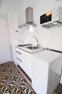 Kuchnia lub aneks kuchenny w obiekcie Letmalaga Soho Apartments