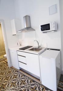 Kuchnia lub aneks kuchenny w obiekcie Letmalaga Soho Apartments