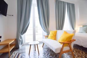 Łóżko lub łóżka w pokoju w obiekcie Letmalaga Soho Apartments