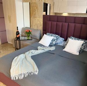 Postel nebo postele na pokoji v ubytování North Nest Luxury Suites
