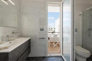 Koupelna v ubytování Infinity Residence con Parcheggio + 72 fotografií