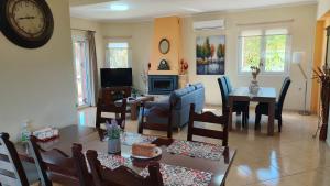 A television and/or entertainment centre at Pazinos/Neveli Cottage