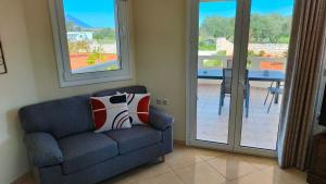 A seating area at Pazinos/Neveli Cottage