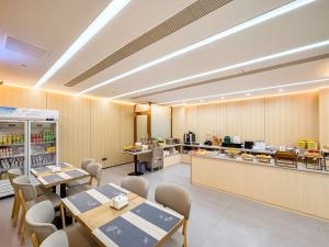 Restaurace v ubytování Yibo Hotel - Pazhou Convention and Exhibition Center - Walking distance to Canton Fair