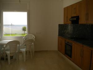 Kuchyň nebo kuchyňský kout v ubytování Villa Nissma