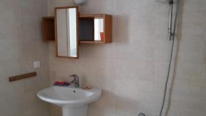 Koupelna v ubytování Villa Nissma + 17 fotografií