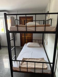 Postel nebo postele na pokoji v ubytování YP Hostel