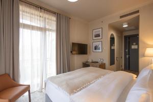 Ένα ή περισσότερα κρεβάτια σε δωμάτιο στο Panorama Kakheti Resort