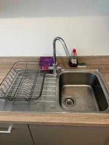 Η κουζίνα ή μικρή κουζίνα στο River Wharf Apartment +38 φωτογραφίες