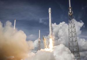 a rocket lifting off from aysical station with a cloudysical at Unit 109 -1br Apt Oceanfront Complex With Pool in Cocoa Beach
