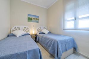 Ένα ή περισσότερα κρεβάτια σε δωμάτιο στο La Casita de Marcelo