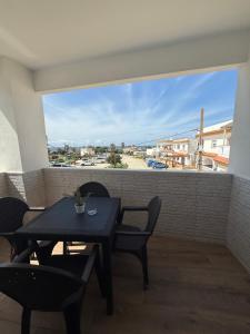 Балкон или терраса в Apartamentos Bolonia - M a n u e l a
