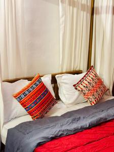 Una cama o camas en una habitación de Cure Monastery Family Resort