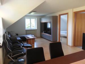 TV a/nebo společenská místnost v ubytování Appartement Feldkirch In Feldkirch