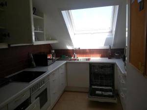 Kuchyň nebo kuchyňský kout v ubytování Appartement Feldkirch In Feldkirch