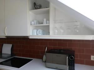 Kuchyň nebo kuchyňský kout v ubytování Appartement Feldkirch In Feldkirch