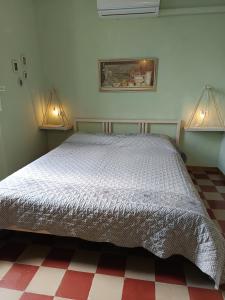 Postel nebo postele na pokoji v ubytování L'Acero Rosso