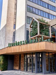 a building with a sign that reads mulhouse hotel at Treehouse Hotel Manchester in Manchester