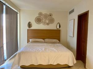 Postel nebo postele na pokoji v ubytování Hermoso condominio frente al mar