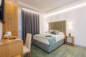 Postel nebo postele na pokoji v ubytování Relais San Francesco