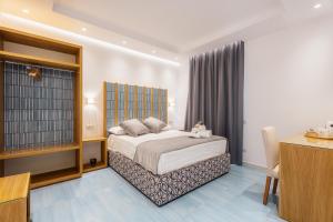 Postel nebo postele na pokoji v ubytování Relais San Francesco