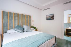Postel nebo postele na pokoji v ubytování Relais San Francesco