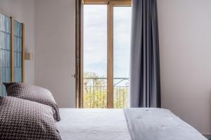 Postel nebo postele na pokoji v ubytování Relais San Francesco