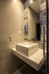 Bathroom sa Tapu'a Departamentos