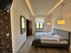 Postel nebo postele na pokoji v ubytování Landgasthof & Hotel Waldeck