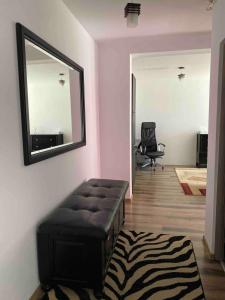 Posezení v ubytování Laura Apartament + 1 fotografie