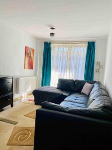 Posezení v ubytování Laura Apartament