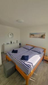 Postel nebo postele na pokoji v ubytování Ferienwohnung Maximilian