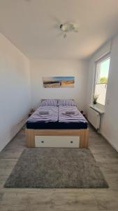 Postel nebo postele na pokoji v ubytování Ferienwohnung Maximilian