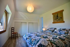 Posteľ alebo postele v izbe v ubytovaní Gîte de la ferme Cour Lecoq