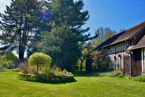 Vonkajšia záhrada v ubytovaní Gîte de la ferme Cour Lecoq