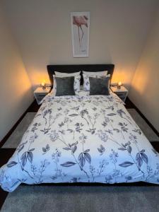 Postel nebo postele na pokoji v ubytování Apartman JV